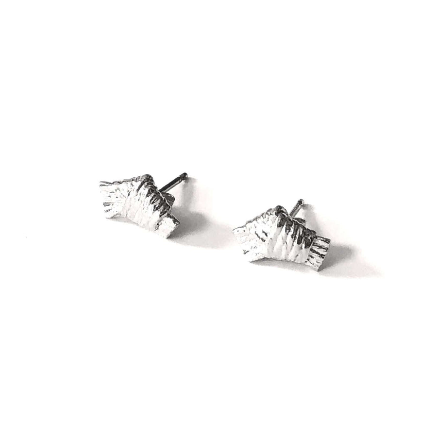 An alternate version of the Bow Stud Earrings by COG are available in polished sterling silver.