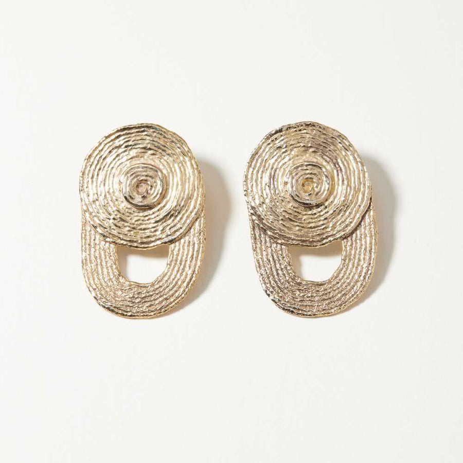 Bridget Earrings by COG are stacked, radiating circles of 14k gold plated recycled brass disks.