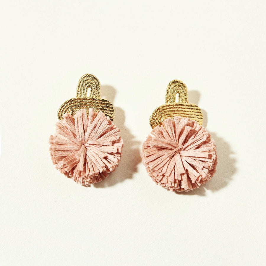 The Hannah Tassels in Peony Pink Habu Cotton. Toped with a textured, 14k gold plated earring.
