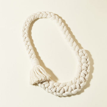 An oversized organic cotton and cashmere merino braided, knotted and tasseled necklace. The Keel Necklace from the Sail collection.
