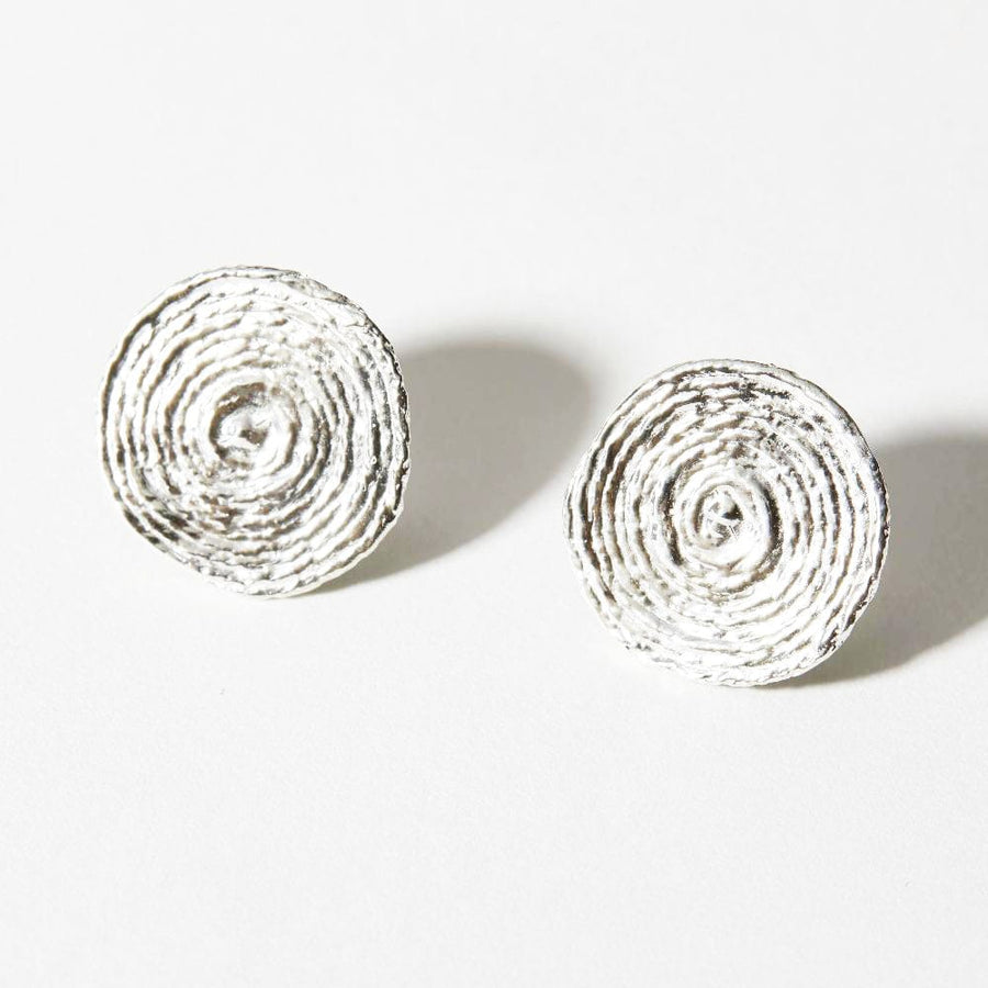 The Orbit Studs are textured spheres measuring 1inch. Made in solid 925 sterling silver.