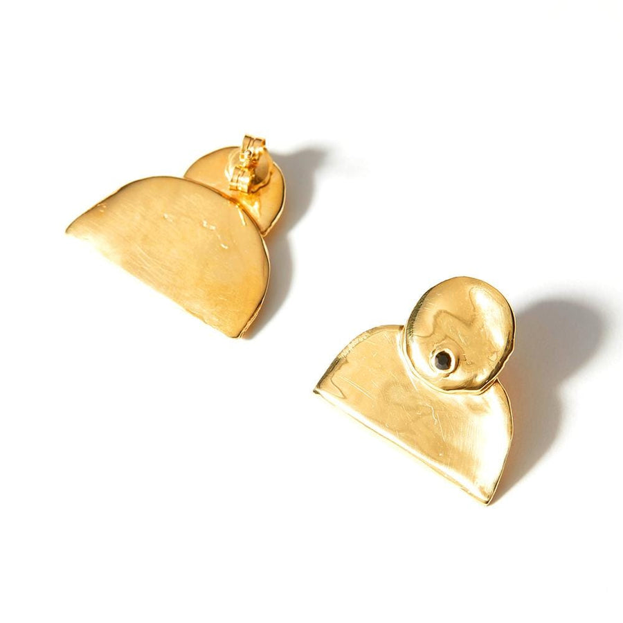 Organic shapes, smooth finish and small crystal detail off the Terra Earrings from COG.