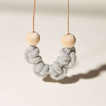 The Half Hitch Necklace is a macramé inspired piece.