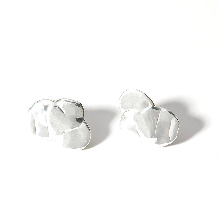 Three flat, overlapping, circular shapes in sterling silver create the Droplet Stud Earrings.